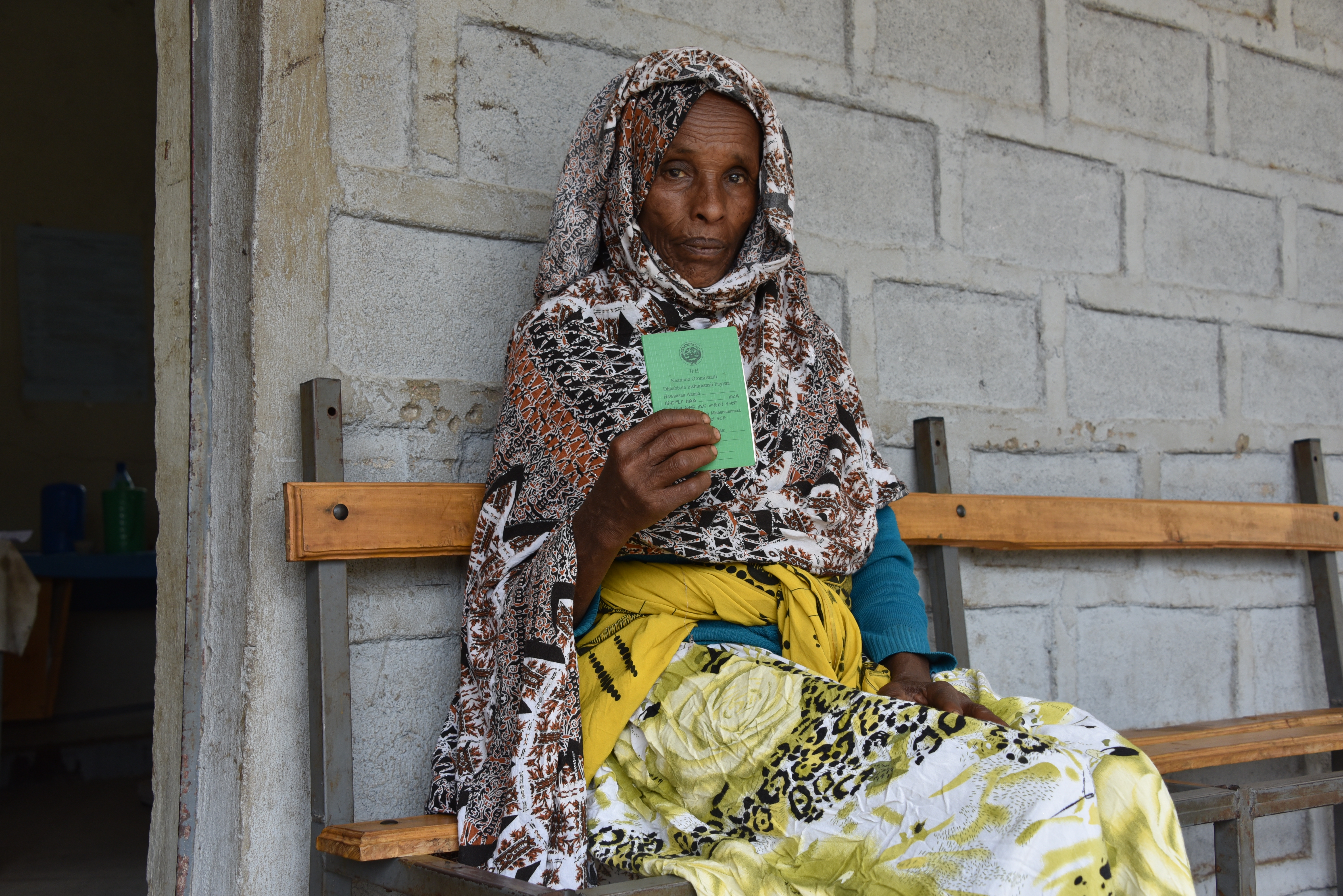 woman with CBHI card